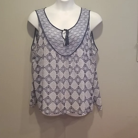 Rose & Olivia blue design sheer sleeveless blouse. - Picture 1 of 7
